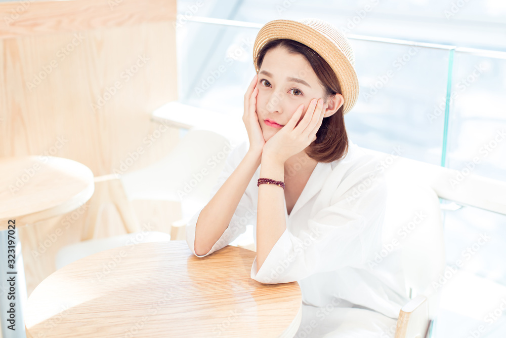 beautiful woman enjoying leisure time in a shooping center,shandong province,china. beautiful woman enjoying leisure time in a shooping center,shandong province,china.