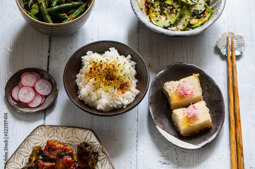 Japanese set meal with rice, tofu, chicken and vegetables photo