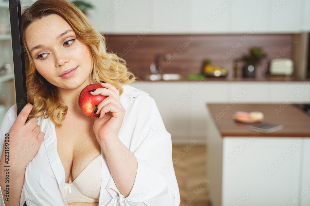 Dreamy young woman thinking about romantic date Dreamy young woman thinking about romantic date