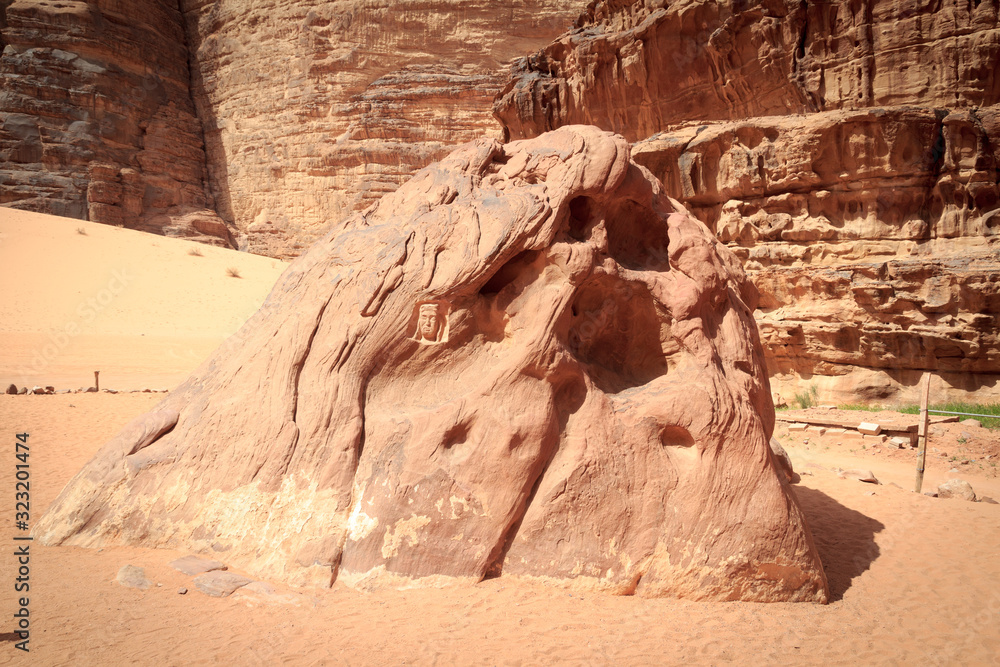 Lawrence of Arabia head carved into the stone in Wadi Rum desert, Jordan
