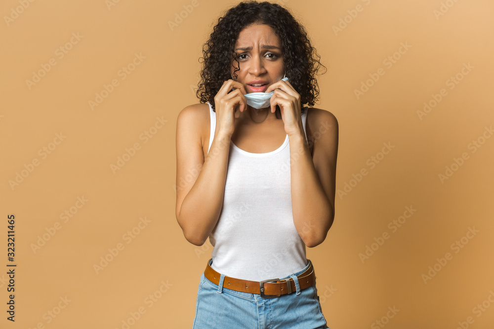 Girl tourist with a medical mask against a viral infection, coronavirus 2020. Fear of illness. Epidemic Prevention Concept Girl tourist with a medical mask against a viral infection, coronavirus 2020. Fear of illness. Epidemic Prevention Concept