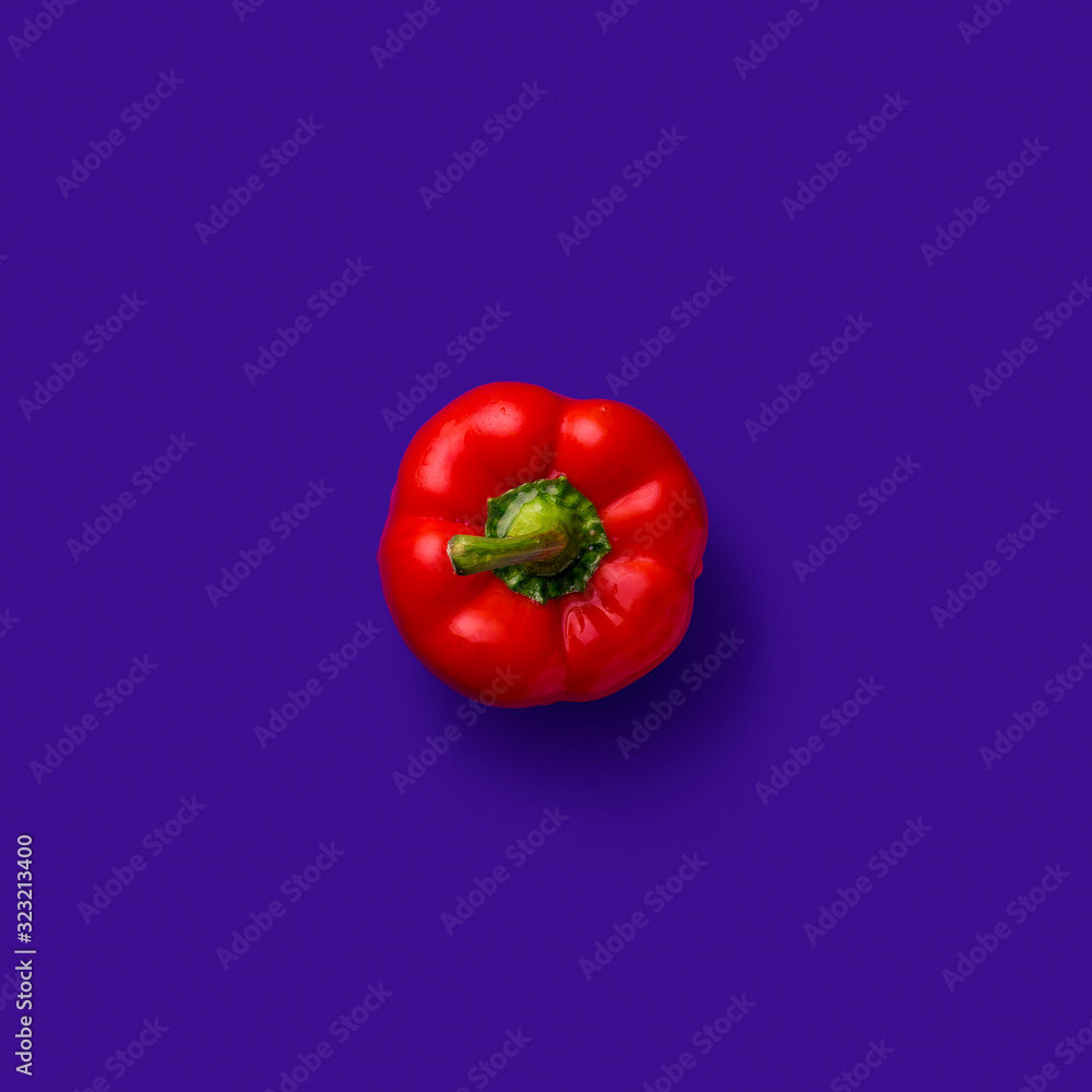 red pepper on a blue background. bell pepper on a blue background. sweet pepper on a blue background. red paprika