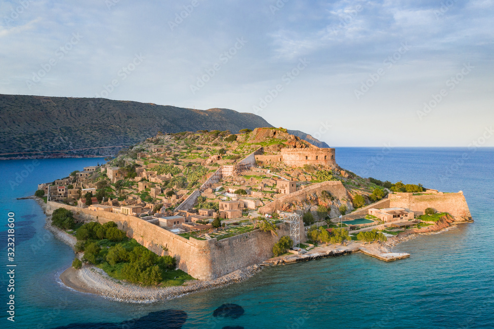 Aerial view of the island of Spinalonga with calm sea. Here were isolated lepers, humans with the Hansen's desease, gulf of Elounda, Crete, Greece. 