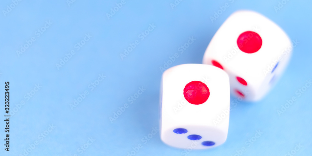The image of dices on the colour background The image of dices on the colour background