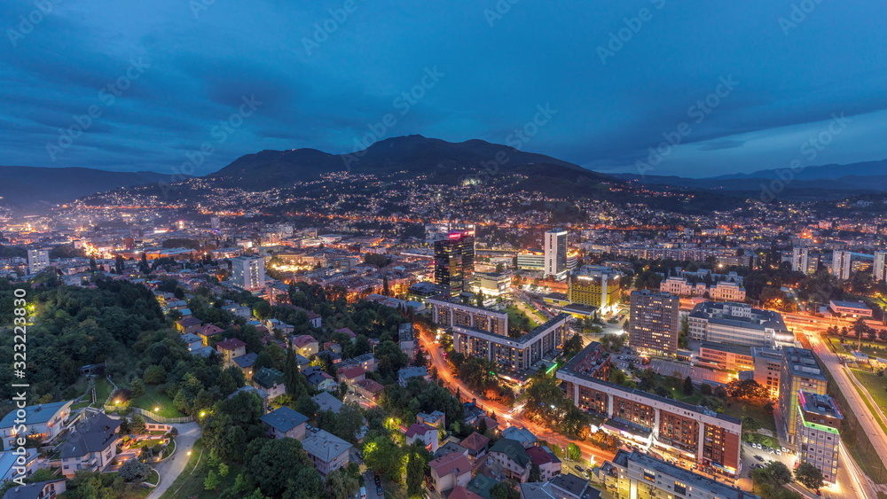 Aerial view of the southern part of Sarajevo city day to night timelapse.