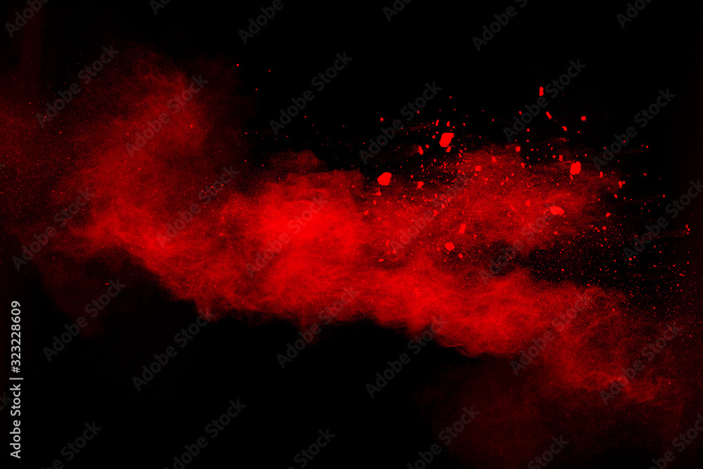 Red powder explosion cloud on black background. Red powder explosion cloud on black background.