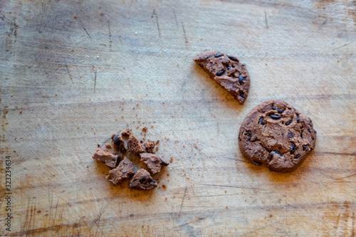 Broken chocolate chip cookies. Cookies broken in pieces with crumbs - concept image for internet privacy and data security