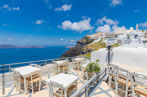 Beautiful view of picturesque town in Santorini, caldera and volcano on the Mediterranean Sea. Traditional white architecture, holiday island of luxury summer vacation destination in Greece