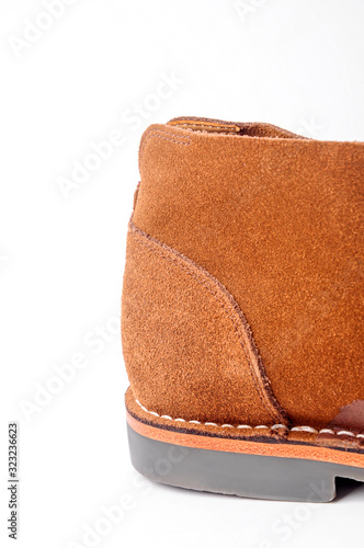 Fototapeta Naklejka Na Ścianę i Meble -  Close-up of cowhide banded leather shoe heel