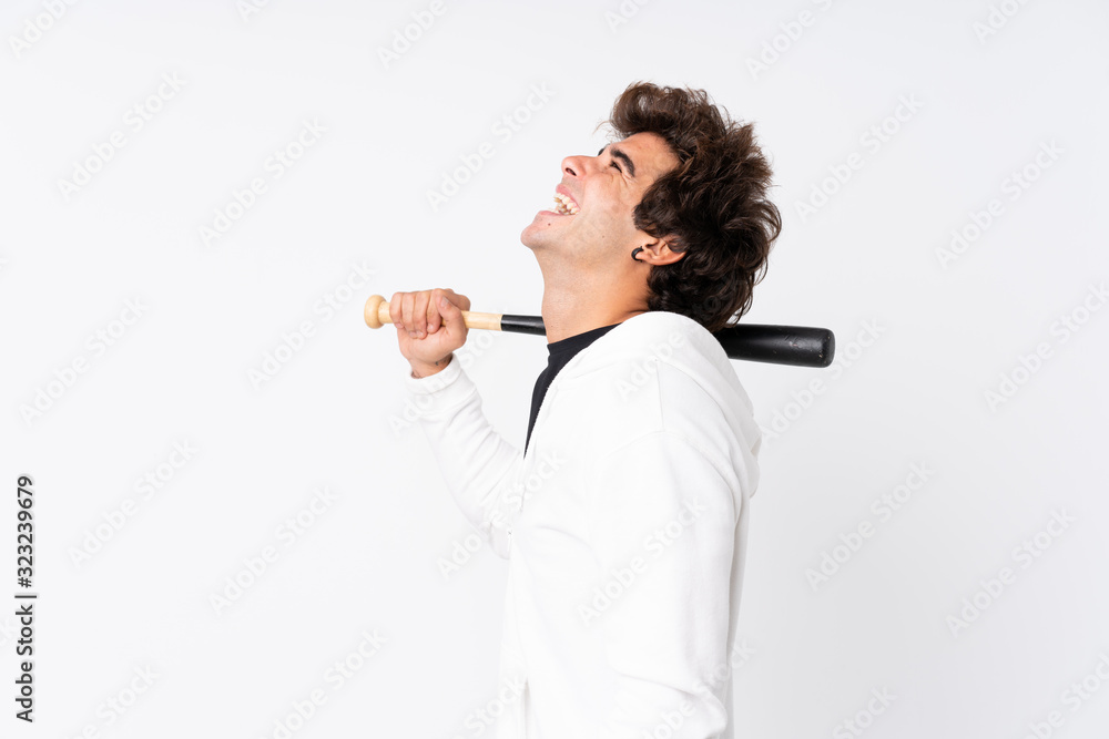 Young caucasian man over isolated white background playing baseball Young caucasian man over isolated white background playing baseball