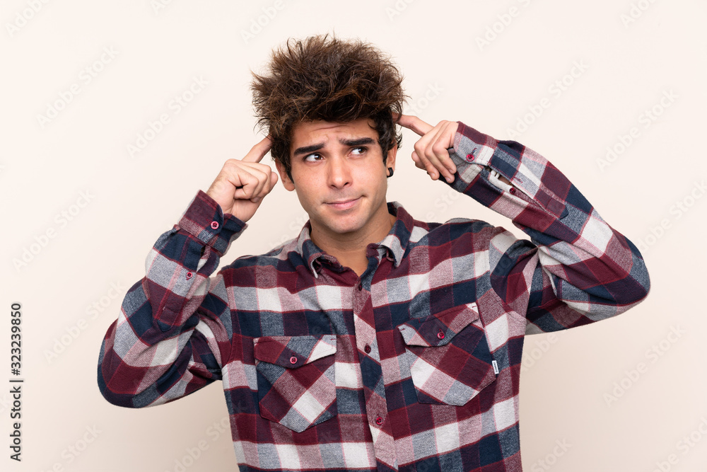Young caucasian man having doubts and thinking Young caucasian man having doubts and thinking