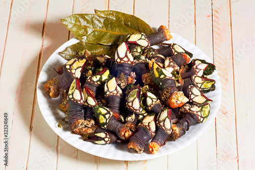 barnacles percebes cooked with bay leafs ,shellfish of galicia , spain photo