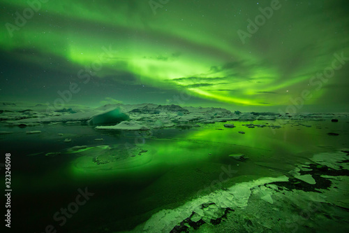 jökulsárlón lagoon under the aurora borealis or northen lights, Iceland