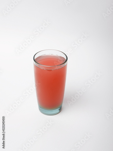Wallpaper Mural  Red juice in a glass on a white background Torontodigital.ca