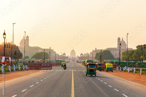 Photography Sunset traffic in New Delhi, tuc tuc cars on the road to the Presidential Resida