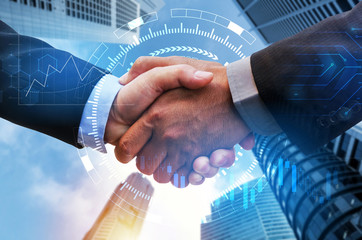 Partnership. business man handshake with digital network link connection, graph chart of stock market graphic diagram and city background, digital technology, internet communication, teamwork concept