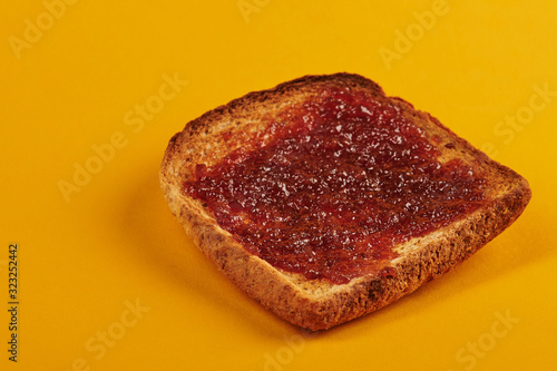 Side view of toast with jam