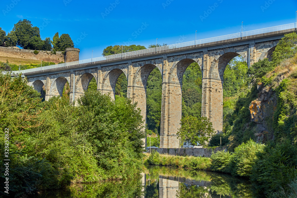 Image of the stone road viaduct over the Canal d'ille du Rance at Dinan, Brittany, France