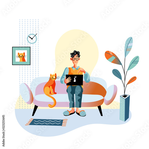 Happy man work on laptop sitting on sofa at home