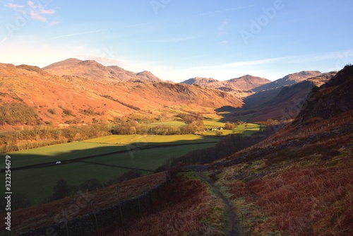 Track down to the green pasture of the Eskdale Valley photo