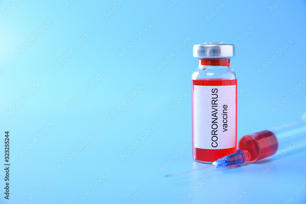 Coronavirus vaccine shot Covid 19 for baby vaccination on blue background, medicine and drug concept Coronavirus vaccine shot Covid 19 for baby vaccination on blue background, medicine and drug concept