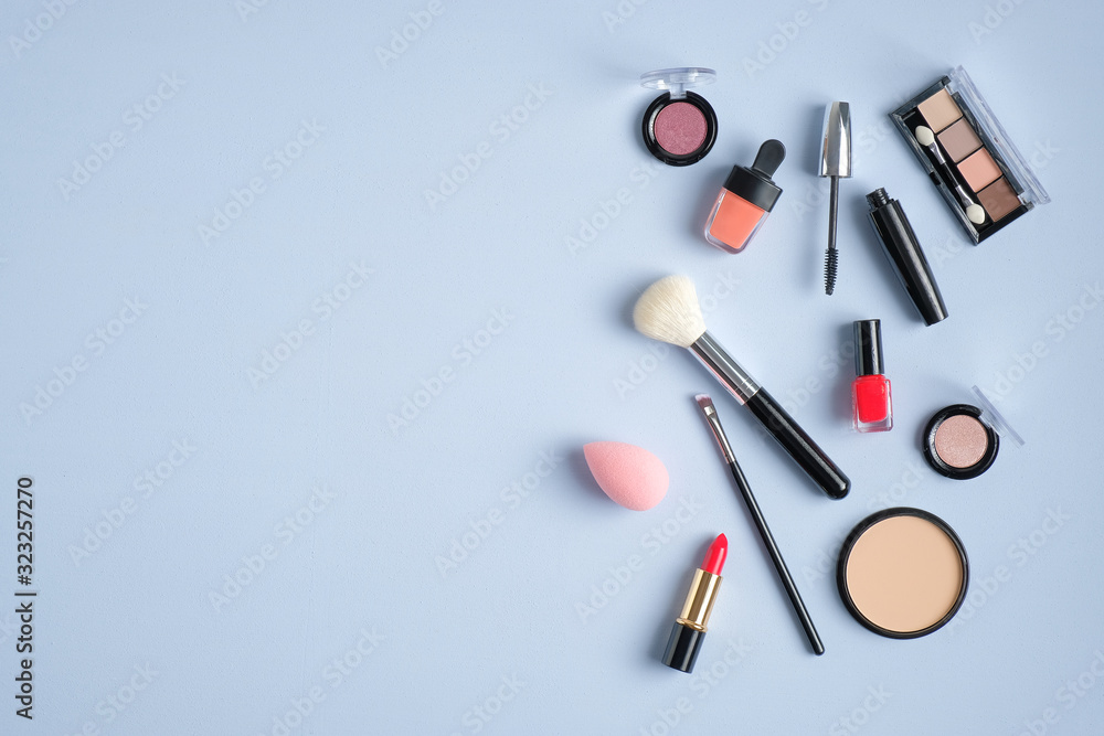 Makeup professional cosmetics on blue background. Top view wit copy space. Beauty  salon banner design template Stock Photo | Adobe Stock