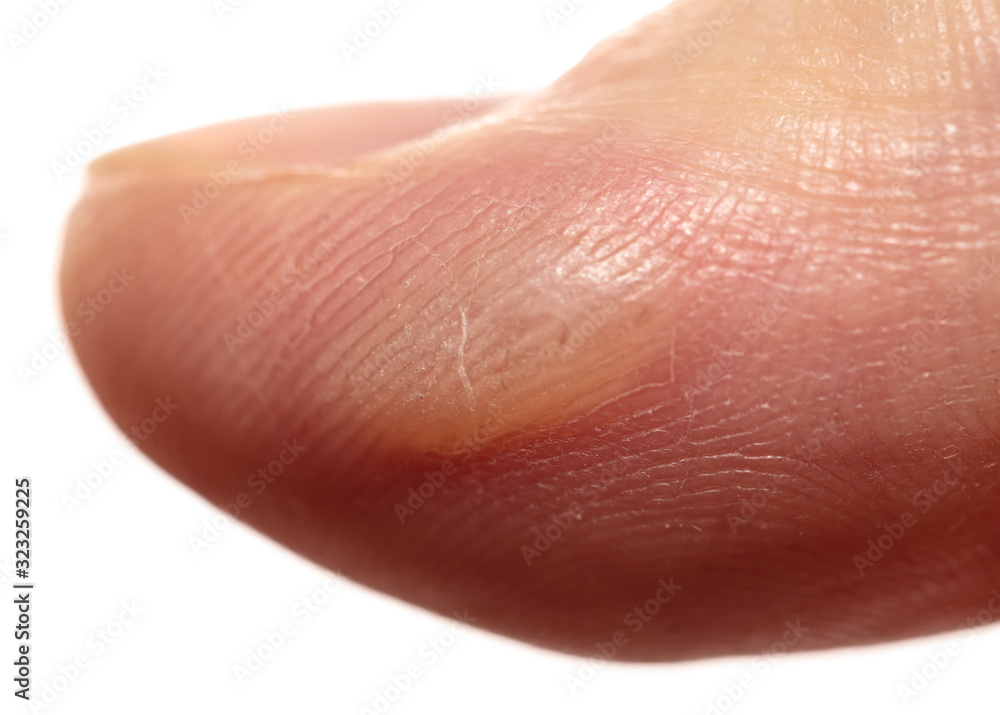 Corn on a finger isolated on a white b Corn on a finger isolated on a white b