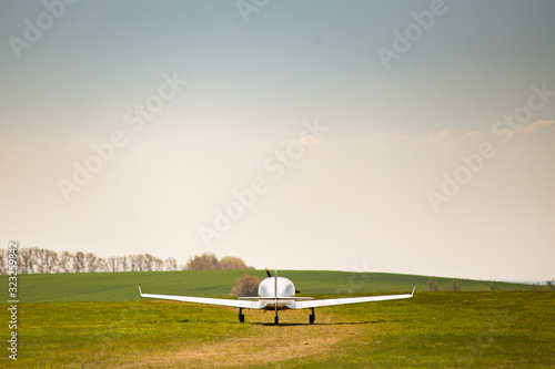 An airplane takes off on a field