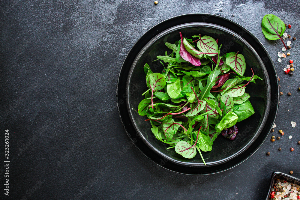 Healthy salad, leaves mix salad (mix micro greens, juicy snack) keto or paleo menu recipe. food background - copy space Healthy salad, leaves mix salad (mix micro greens, juicy snack) keto or paleo menu recipe. food background - copy space