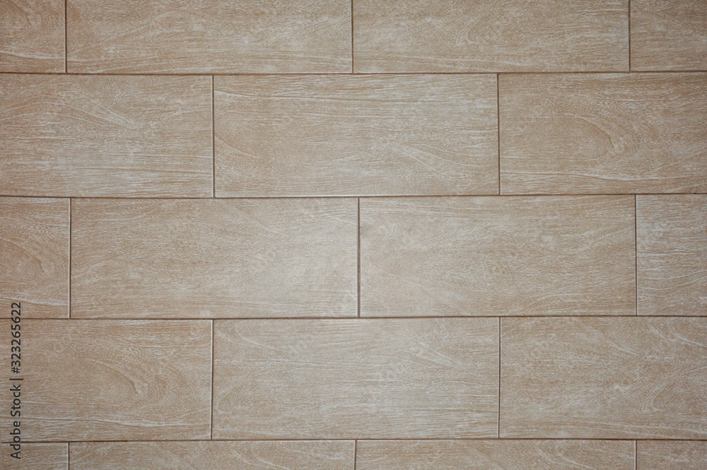 Naklejka premium brown ceramic tiles. texture, background for decoration.