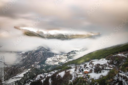 Sant Julia de Loria, Niebla en las montañas después de una gran nevada en invierno. photo
