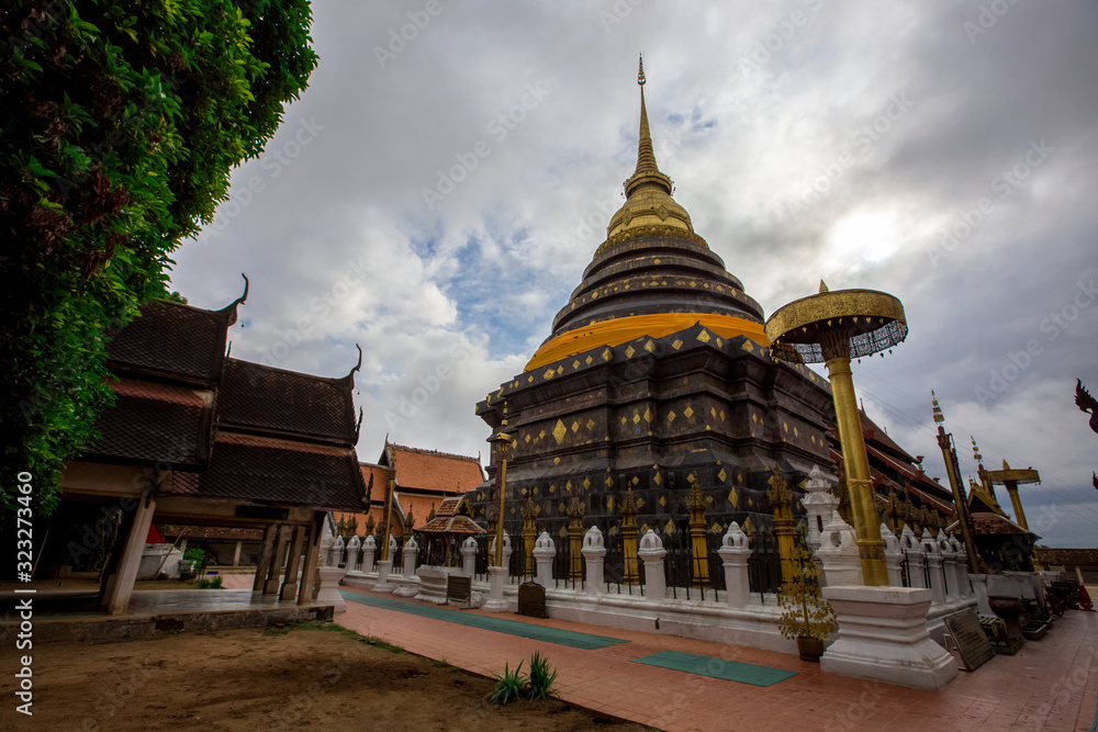 Wat Phra That Lampang Luang-Lampang: 10 August 2019, male and female tourists traveling to the north of Chang Wat Lampang, Thailand Wat Phra That Lampang Luang-Lampang: 10 August 2019, male and female tourists traveling to the north of Chang Wat Lampang, Thailand