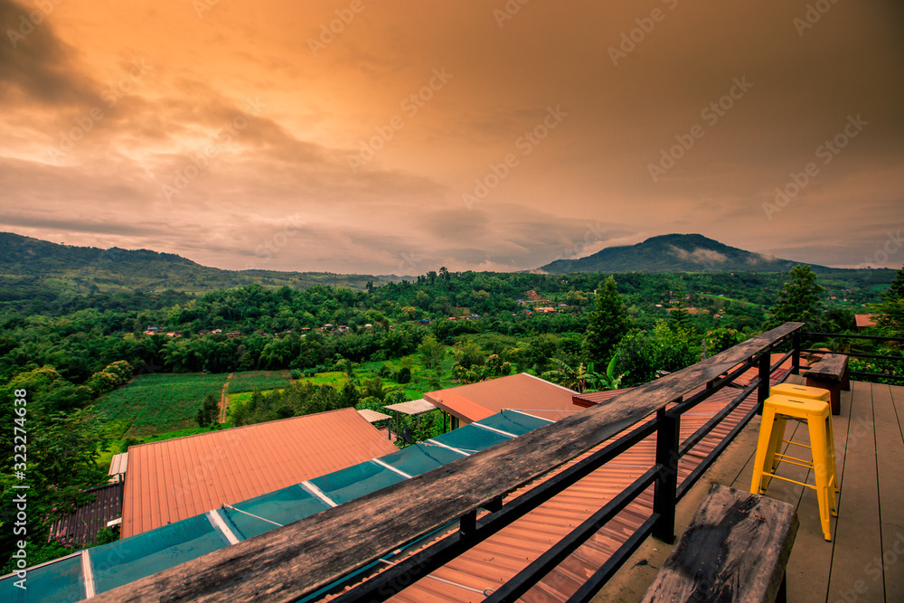 Natural blurred background of fog scattered among trees in the morning,with soft sunlight from the sun,seasonal beauty Natural blurred background of fog scattered among trees in the morning,with soft sunlight from the sun,seasonal beauty