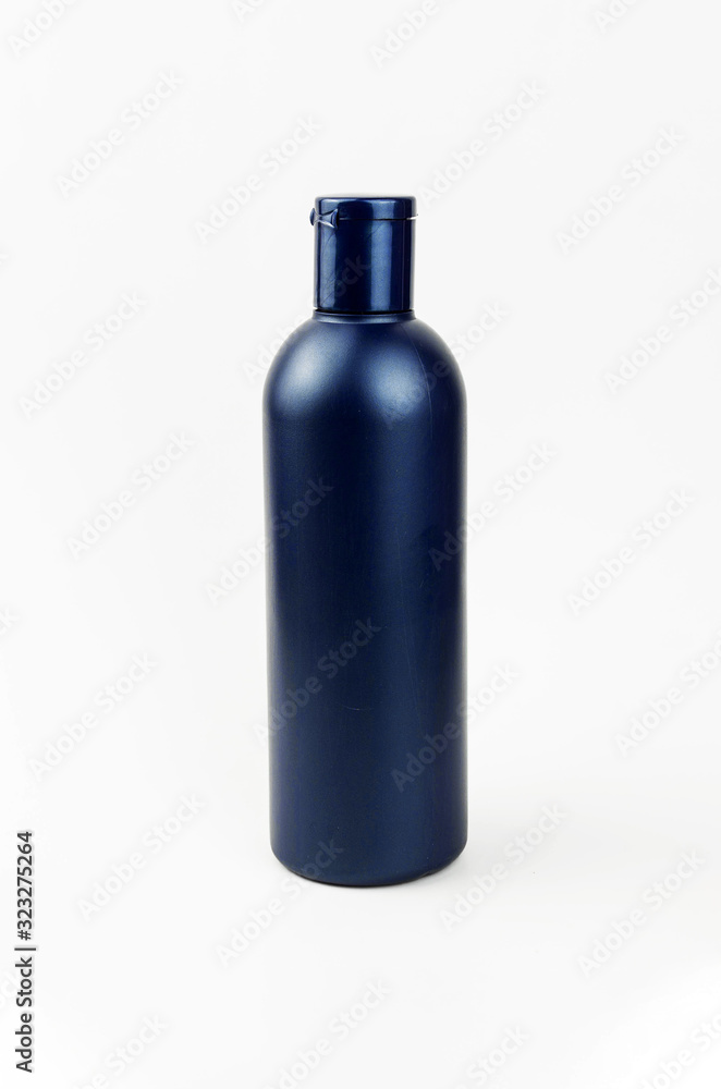 blue bottle of cosmetic blank package on the white background blue bottle of cosmetic blank package on the white background