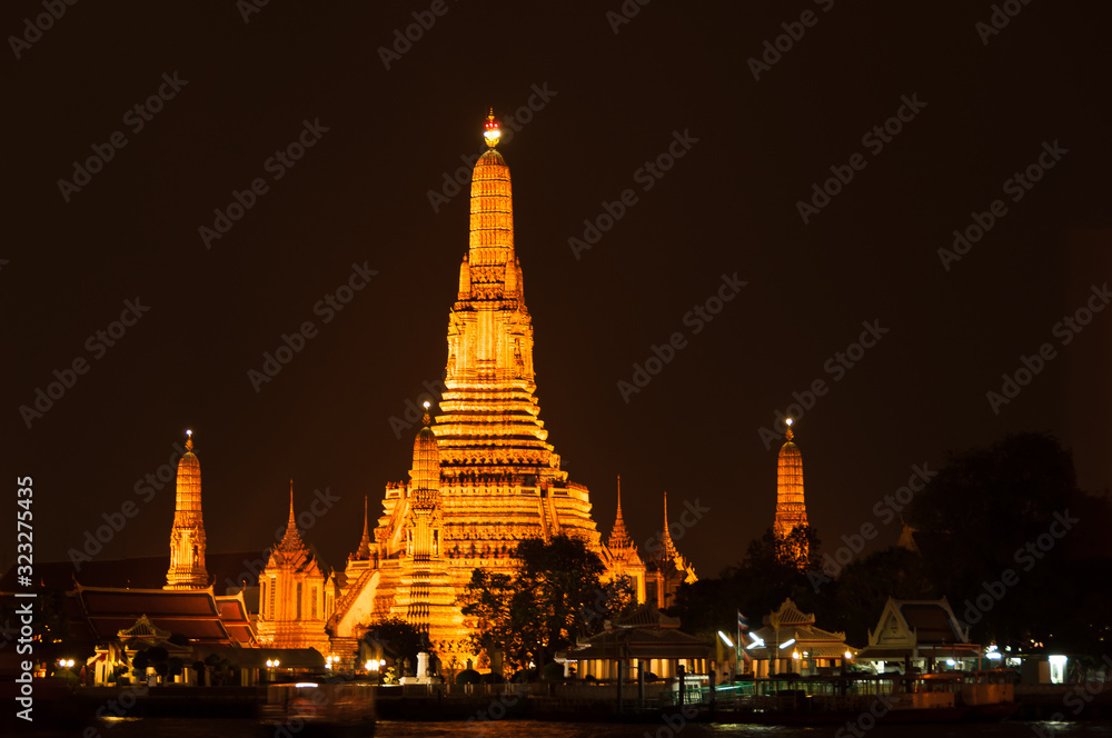 Wat Arun by night in Bangkok. Kingdom of Thailand.