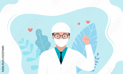 Young doctor with glasses raised his fist and felt the power