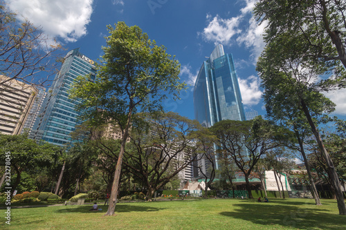 Ayala Triangle gardens and park in Makati, on a sunny day