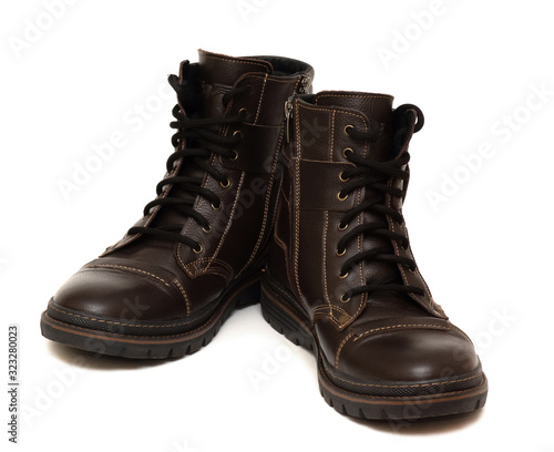 warm boots with fur inside, brown color, isolated on a white background