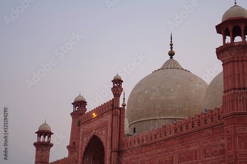 Badshahi mosque from the side in dark light, Pakistan 2019