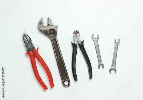 Wallpaper Mural Set of professional work tools on a white background. Top view Torontodigital.ca