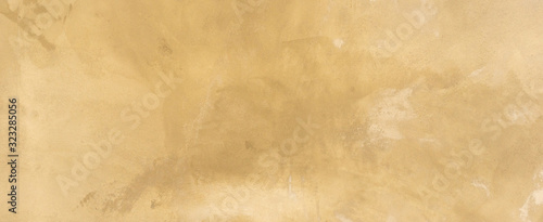 close up retro plain sepia and tan color cement wall   panoramic background texture for show or advertise or promote product and content on display and web design element concept photo