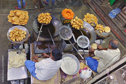  Indian street food vendors near the holy Ganges river. According to legends, Varanasi city was founded by God Shiva about 5000 years ago.