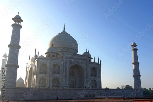The Taj Mahal with blue sky on a hot summer day - Agra, India 2019