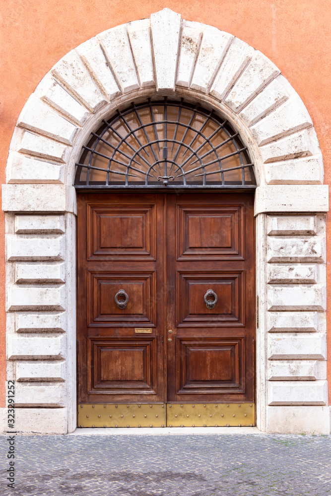 ancient wooden arched door, Italy Europe ancient wooden arched door, Italy Europe