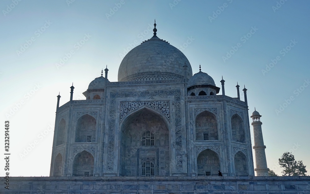 Agra / India - 06.20.2019 : Fabulous Taj Mahal, A UNESCO World heritage , on a bright and blue day -