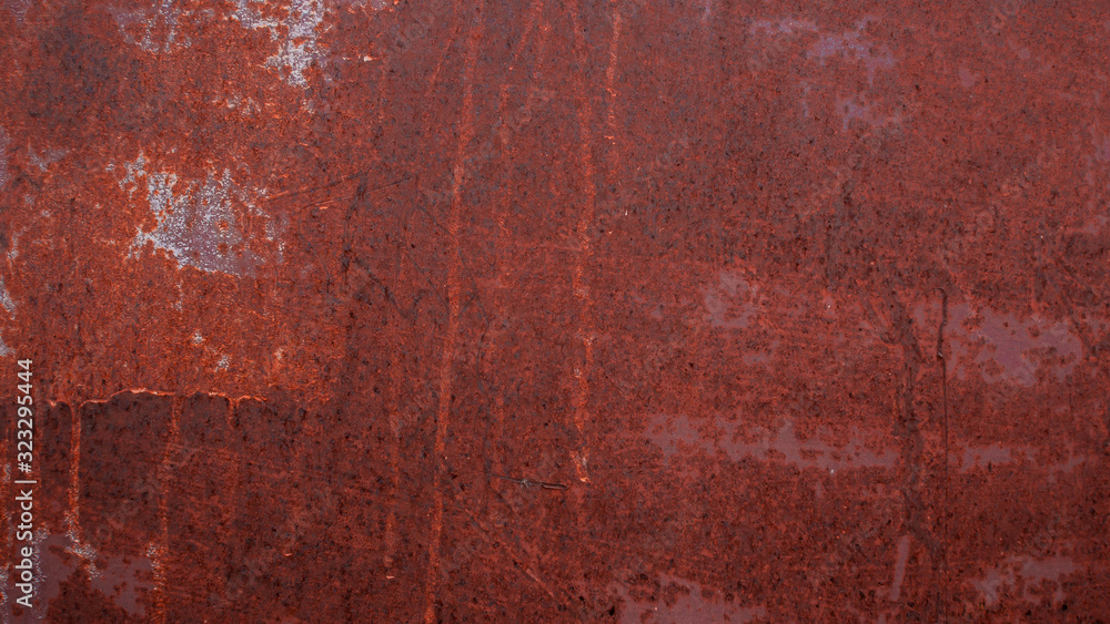 Rust and oxidized metal brown texture. Rusted orange grunge metal background. Old and dirty iron building wall Rust and oxidized metal brown texture. Rusted orange grunge metal background. Old and dirty iron building wall