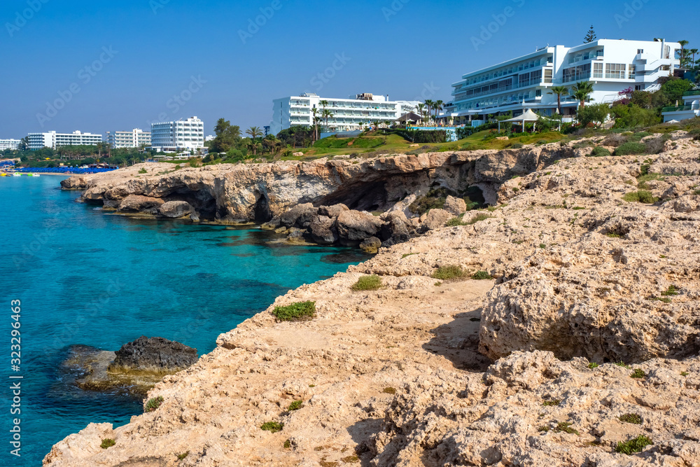 Fototapeta premium Cyprus. Resort of Ayia Napa. Resorts overlooking the Mediterranean Sea. Hotels on the shores of Cyprus. Resort landscape. Nature. Ayia Napa Resort Cruise. Tour to Cyprus. Tropical island