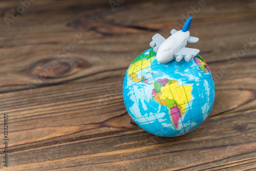 Foto Airplane on the planet globe