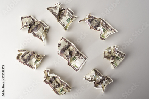 Crumpled dollars top view. ...