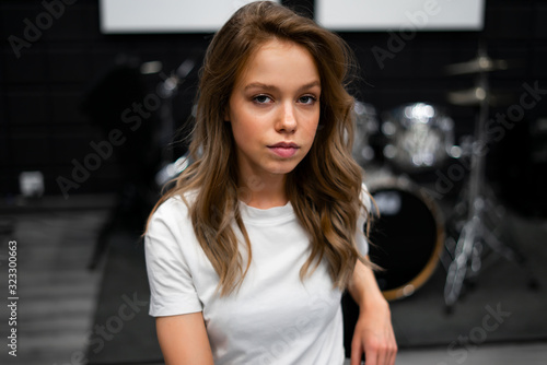 Free Download Creativity and music. Young beautiful girl plays the drums. Recording Studio. Musical equipment. - GFXLoad